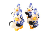 DEKOFIGUREN PINGUINE Set 4 Pinguine Keramik Ton 12 cm Schal Mütze Schneeball Dekoration