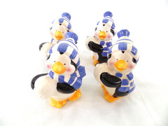 Dekofiguren Set 4 Pinguine Keramik Ton 12 cm Schal Mütze Schneball