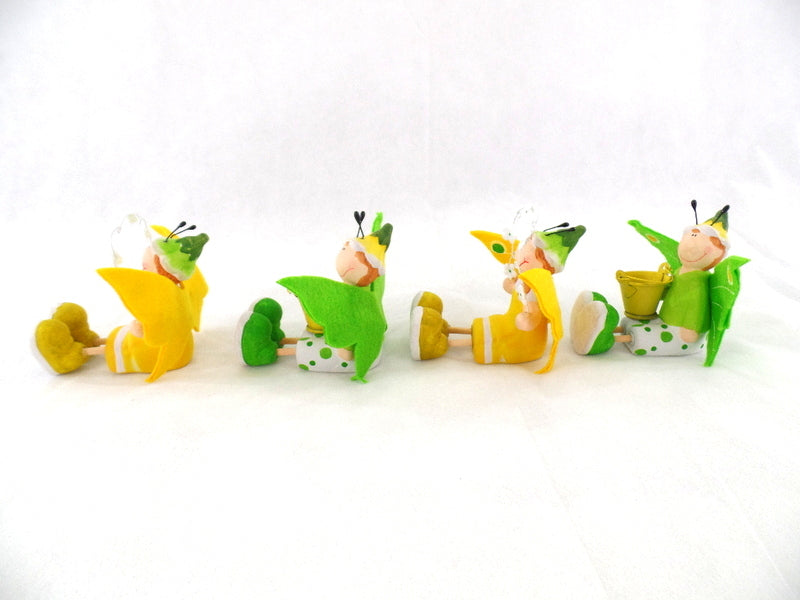 Schmetterling Elfen Figuren Set 4 Stck sitzend Keramik Ton Gelb Grün 8 cm