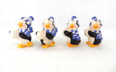 Dekofiguren Set 4 Pinguine Keramik Ton 12 cm Schal Mütze Schneball