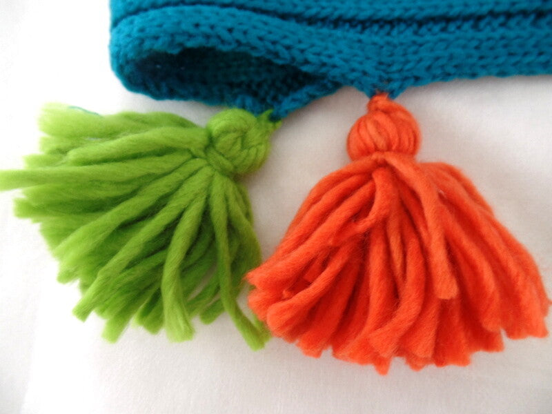 Schal Rundschal Loop Wickelschal Türkis gestrickt Polyester Quasten 70 x 25 cm